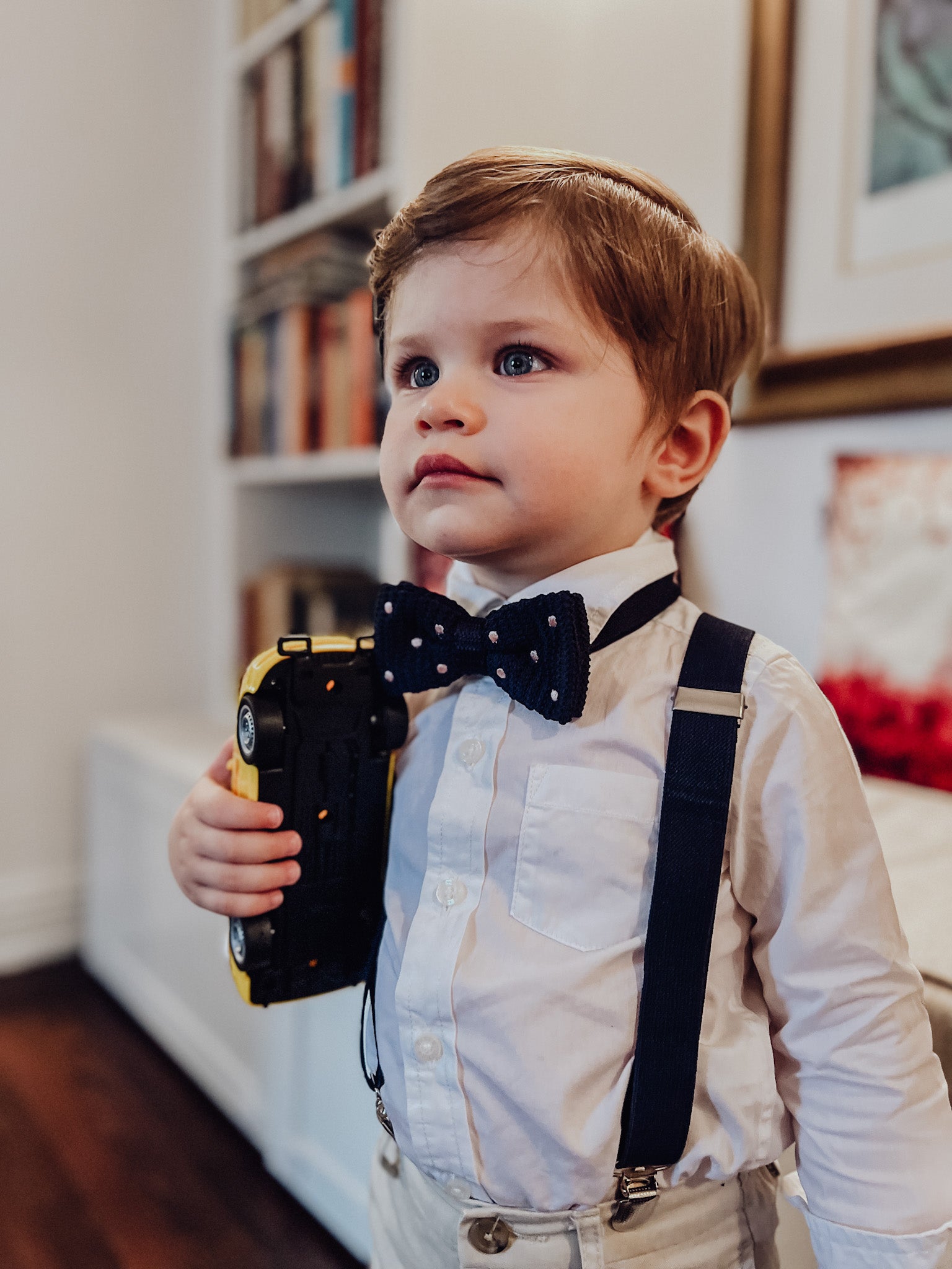 Blue suspenders and bow tie